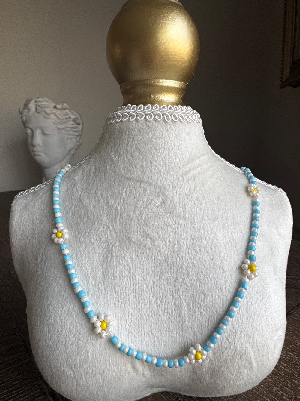 Handmade Blue Beaded Necklace with Daisy Accents